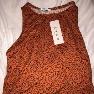 Semi cropped halter flowy leopard print top